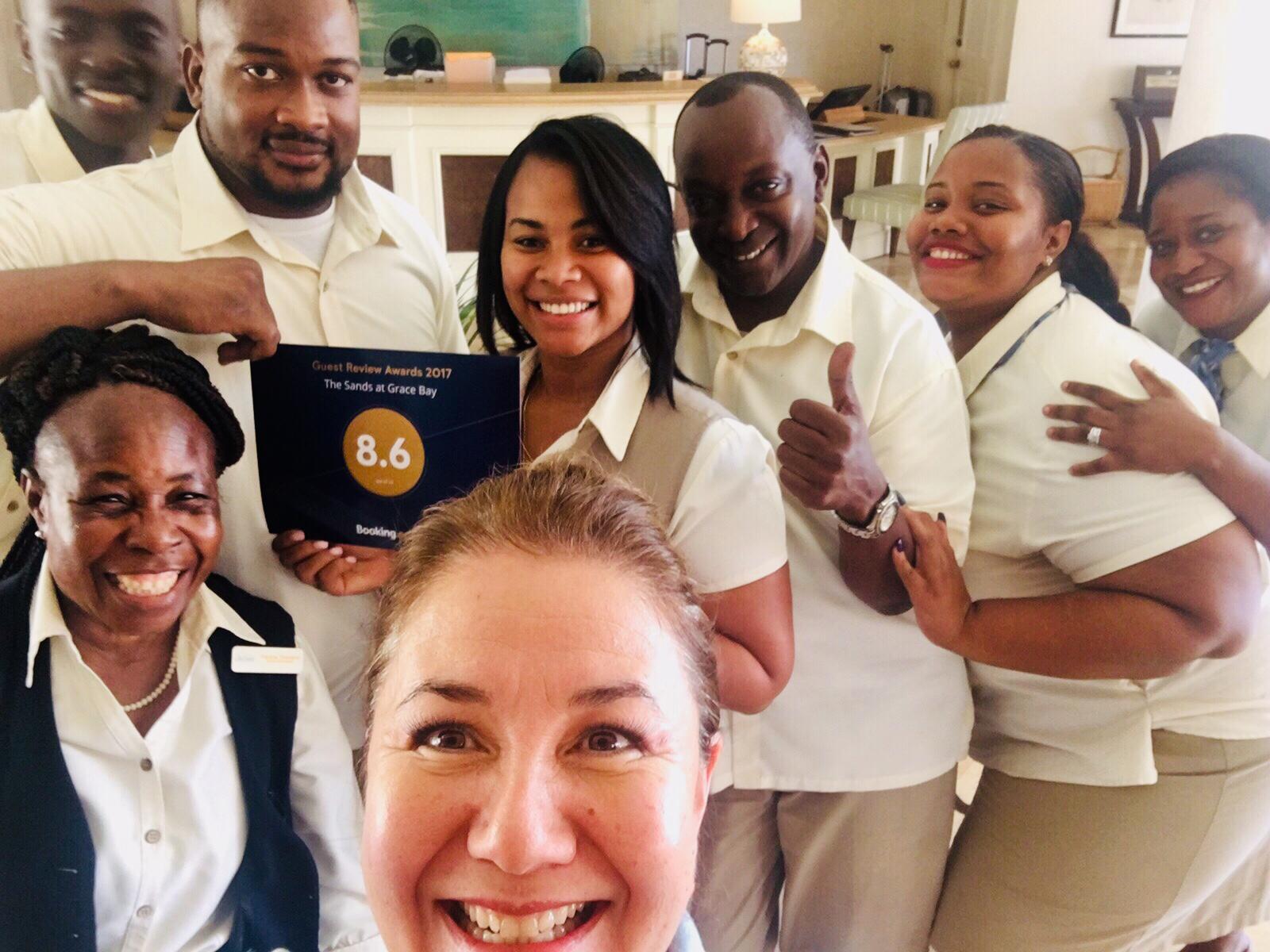 Celebrating The Sands at Grace Bay Booking-dot-com award #guestsloveus